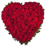 Настольная композиция - 101 роза в виде сердца